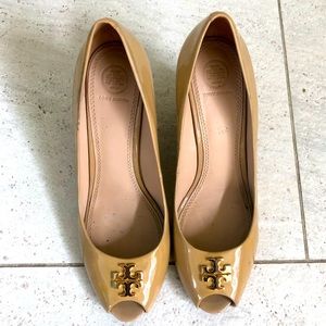Nude Tory Burch peep toe wedges.